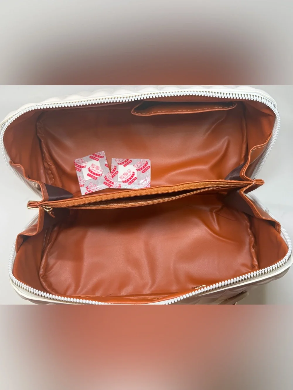 White Quilted Cosmetic Case with Gold Accents